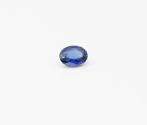 Appraisal: Sapphire An unmounted oval-cut sapphire of rich blue color weighing