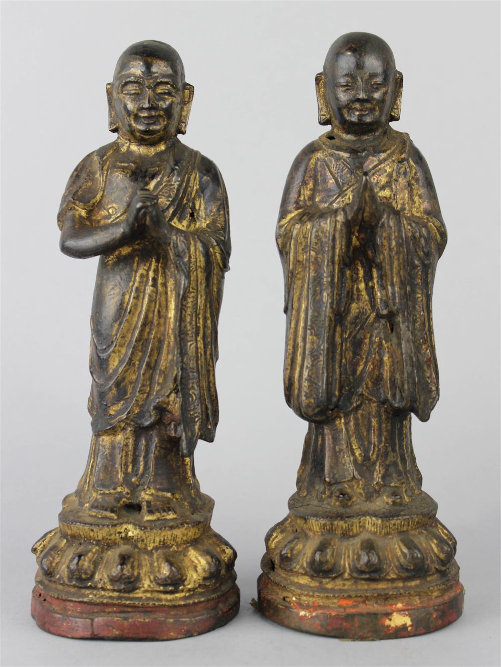 Appraisal: TWO GILT BRONZE SINO-TIBETAN FIGURES OF MONKS TH TH C