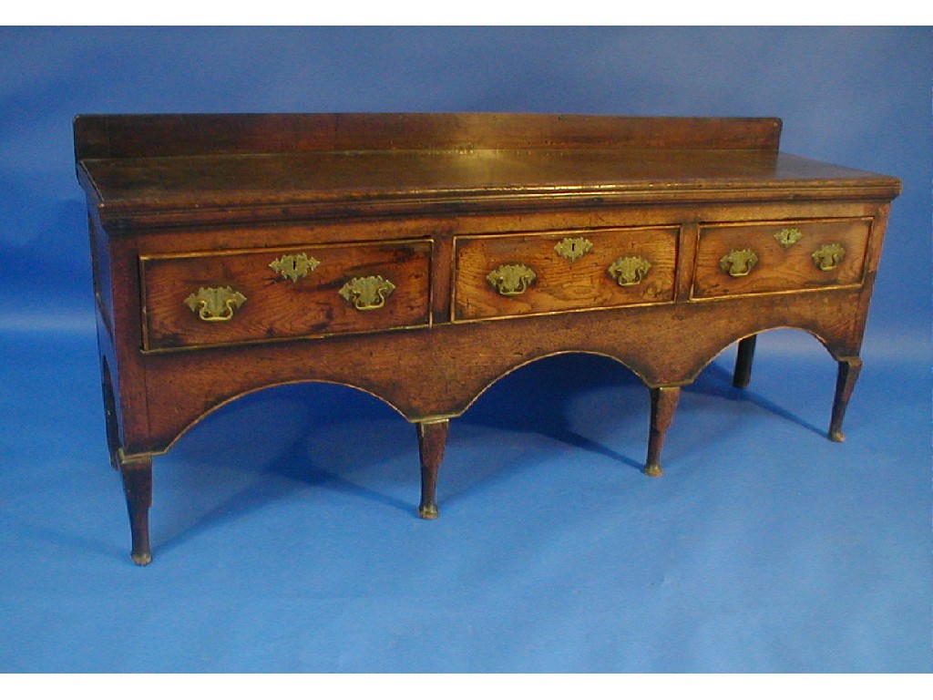 Appraisal: An th century elm and oak dresser base fitted with