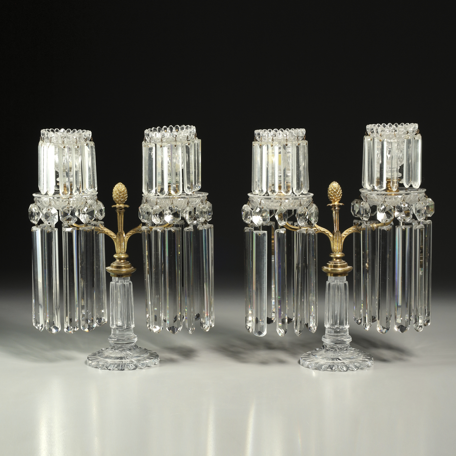 Appraisal: PAIR REGENCY BRONZE AND CRYSTAL CANDELABRA th c bronze and