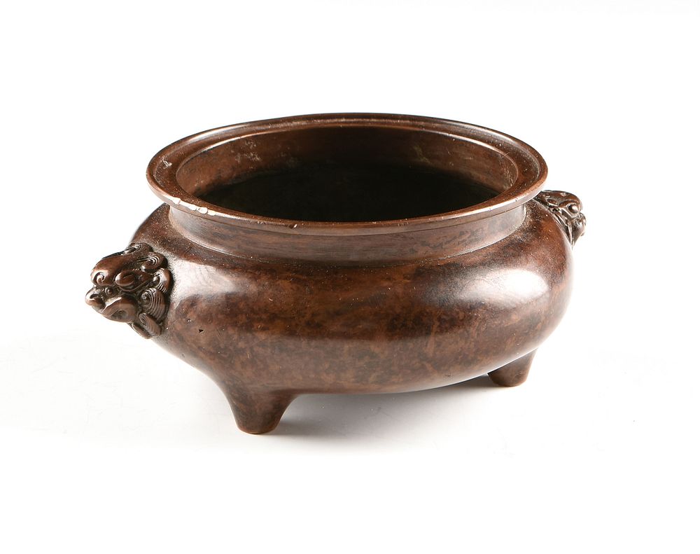 Appraisal: A CHINESE ARCHAISTIC STYLE COPPERED BRONZE TRIPOD CENSER TH TH