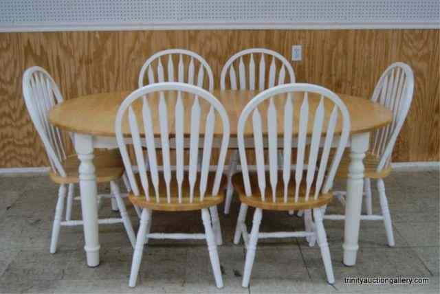 Appraisal: Oak Dining Table w ChairsFrom the estate is a very