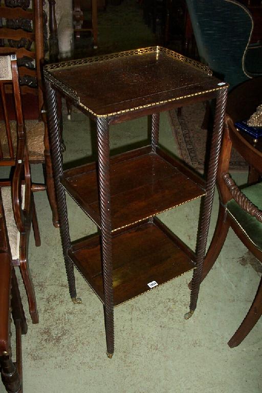 Appraisal: A th century Irish rosewood what-not of -tiers with spiral