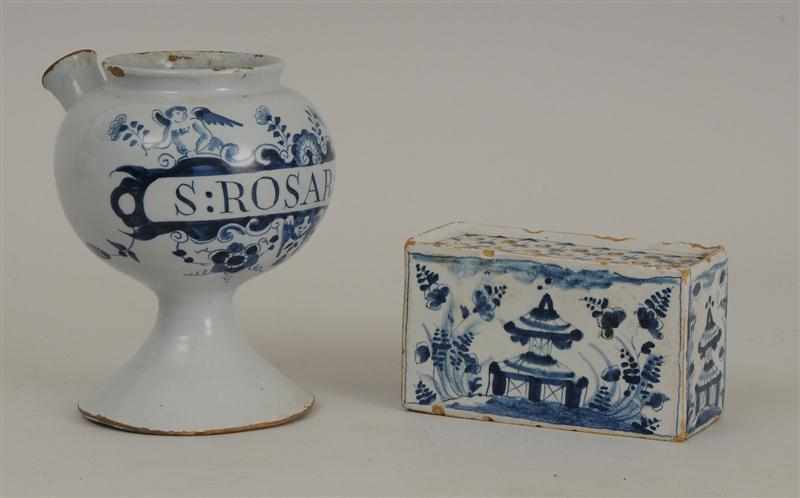 Appraisal: TIN-GLAZED EARTHENWARE BLUE AND WHITE APOTHECARY DISPENSER AND A FLOWER