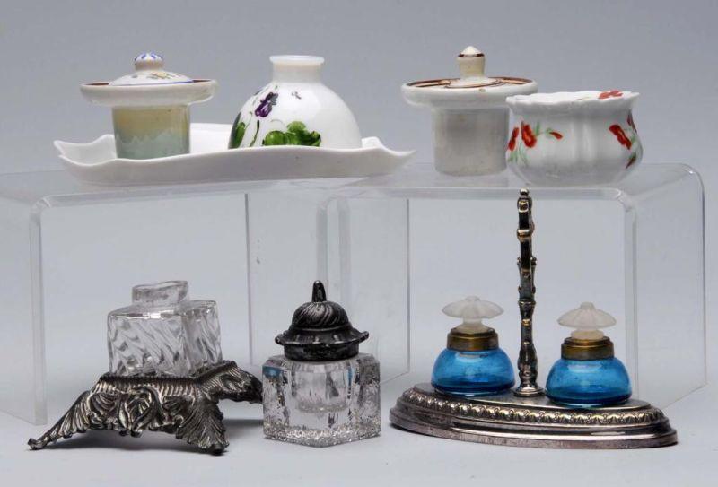 Appraisal: Lot of Metal Porcelain and Glass Inkwells Condition Excellent Size