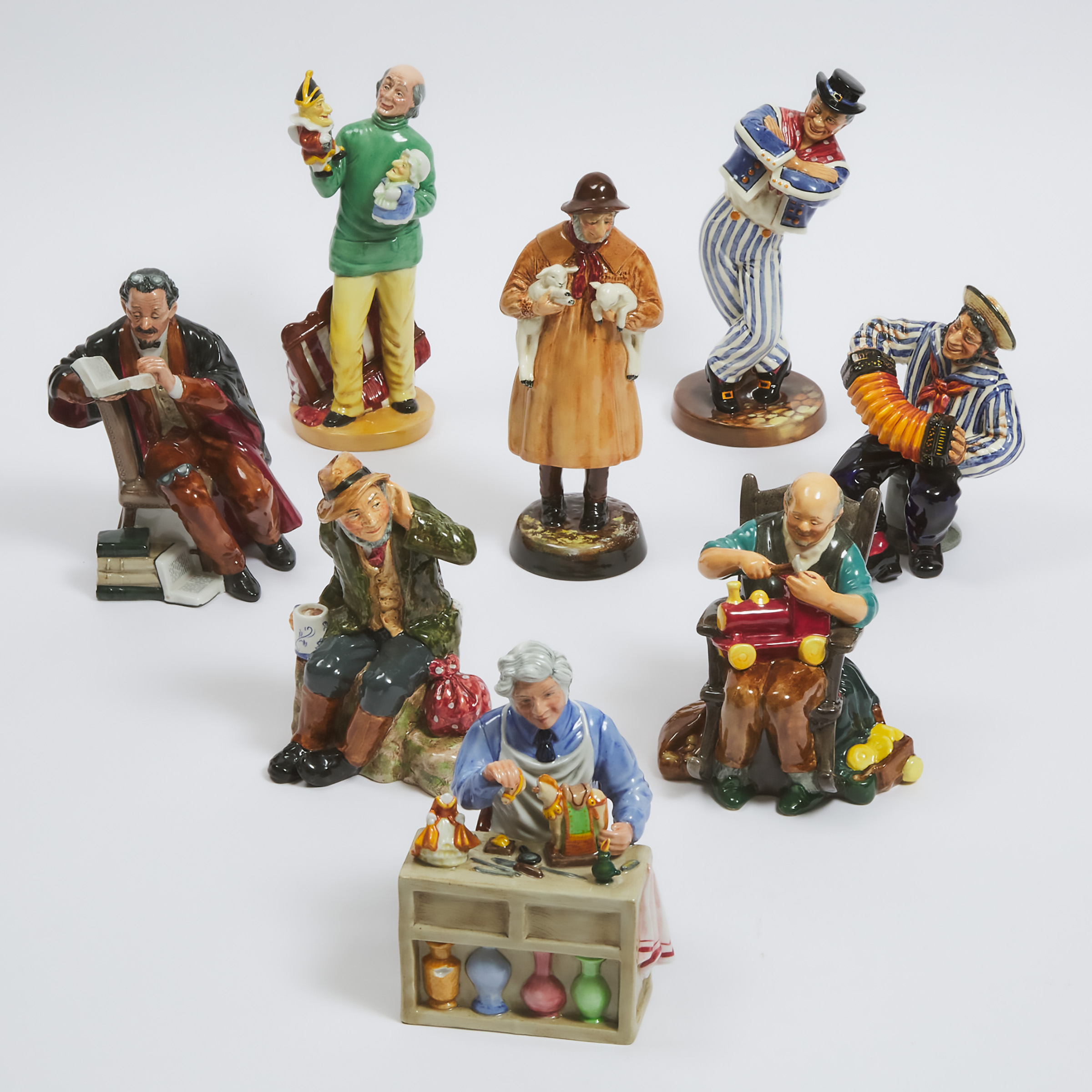 Appraisal: Eight Royal Doulton Figures th century Punch and Judy Man