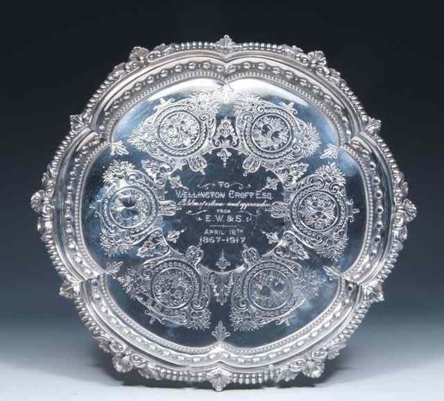 Appraisal: A SILVER SALVER of circular form with beaded border with