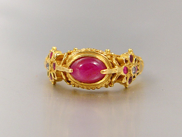 Appraisal: K RUBY DIAMOND RING K yellow gold ring contains one