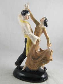 Appraisal: A large Art Deco figure of a couple dancing cm