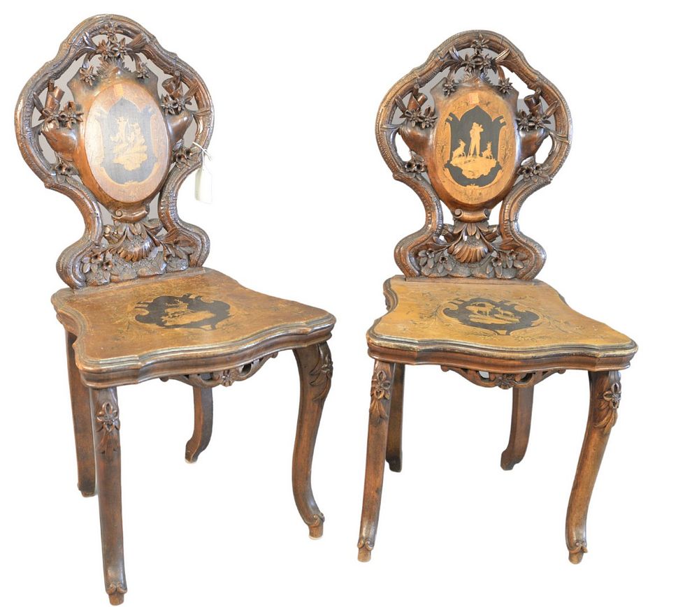 Appraisal: Pair Black Forest Side Chairs with open carved backs and