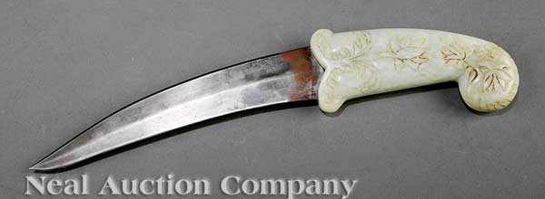 Appraisal: A Mughal Celadon Jade Hilted Steel Dagger the large pale