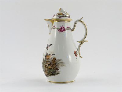 Appraisal: A Continental porcelain coffee pot and cover painted with four