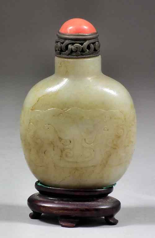 Appraisal: A Chinese pale celadon jade snuff bottle and stopper the