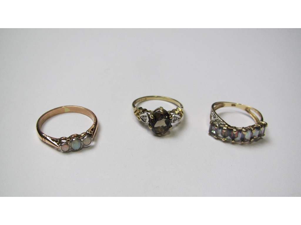 Appraisal: Lot comprising three ct gold rings to include opal three