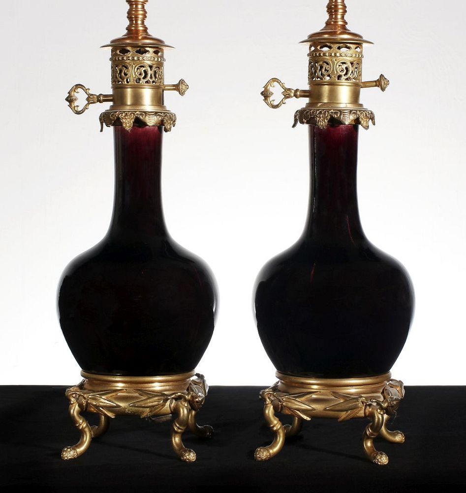 Appraisal: A PAIR FRENCH TH C ORMOLU AND PORCELAIN FLUID LAMPS