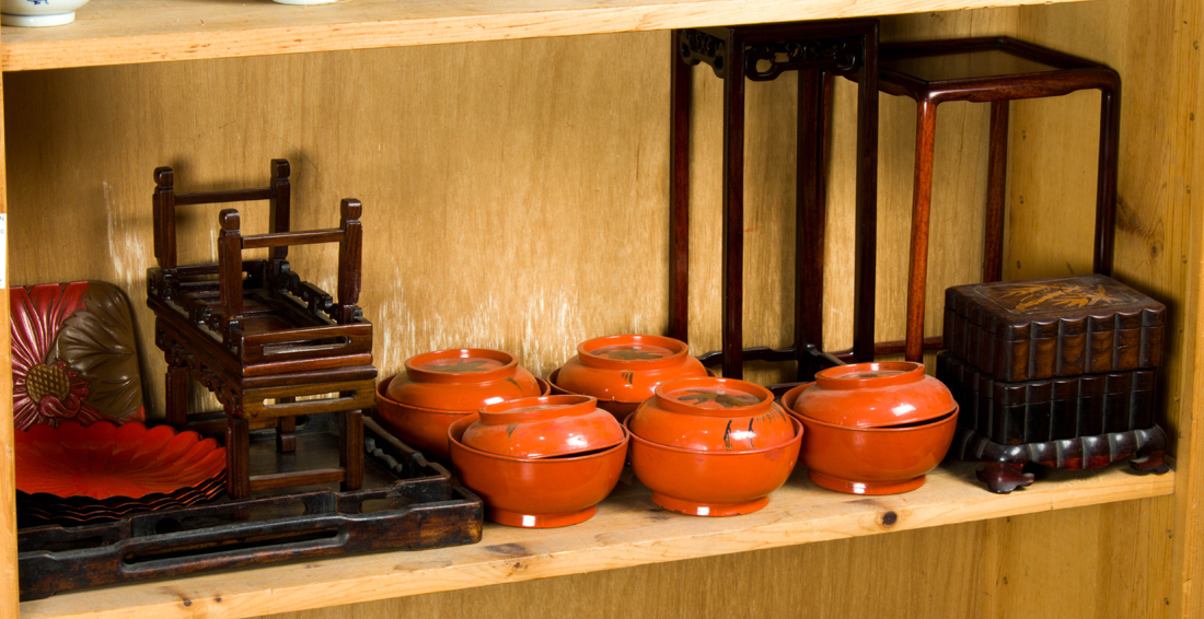 Appraisal: SHELF OF ASIAN WOOD AND LACQUERED DECORATIVE ITEMS Shelf of