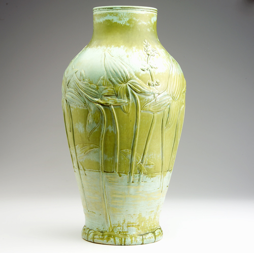 Appraisal: L C TIFFANY Tall vase embossed with arrow root plants