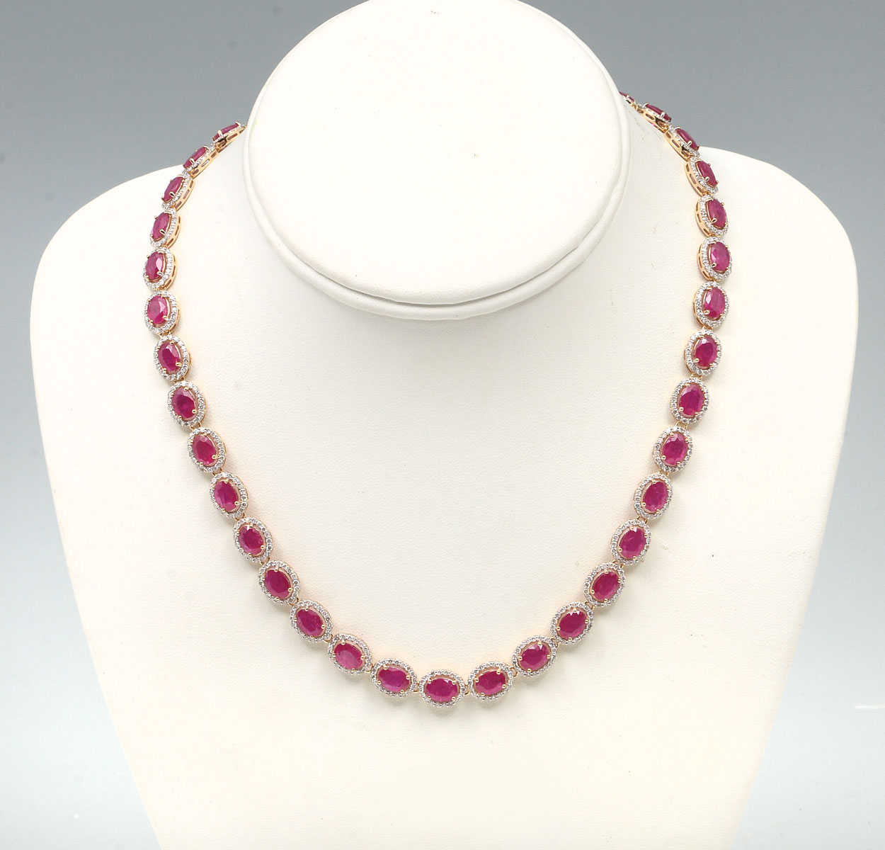 Appraisal: K CTW RUBY DIAMOND NECKLACE K yellow gold necklace is