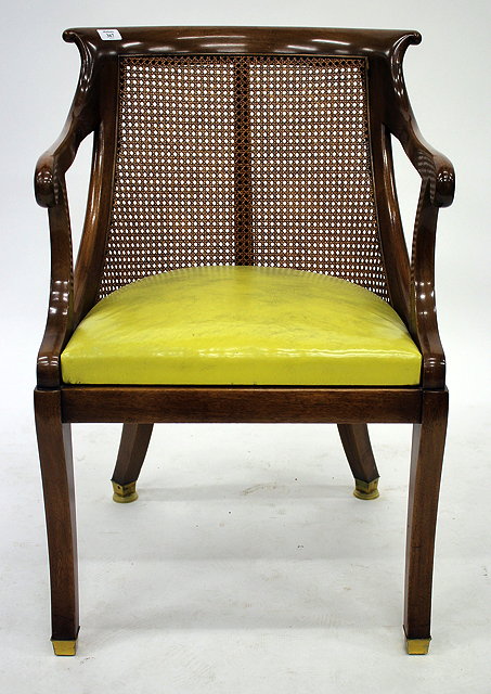 Appraisal: AN AMERICAN MID TH CENTURY DESK CHAIR with curving caned