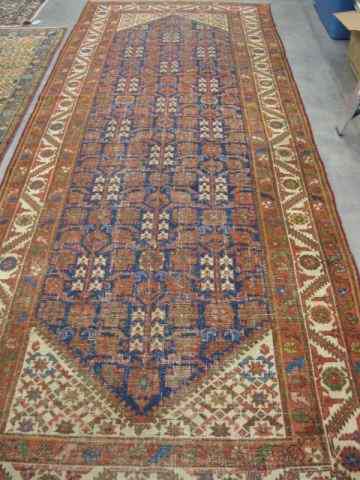 Appraisal: Malayer Persian Handmade Rug overall geometric design even wear '