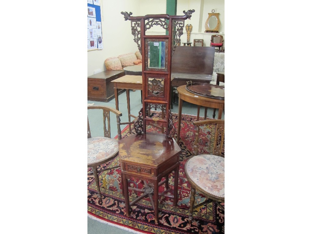 Appraisal: Chinese hardwood plant stand modelled as a hallchair