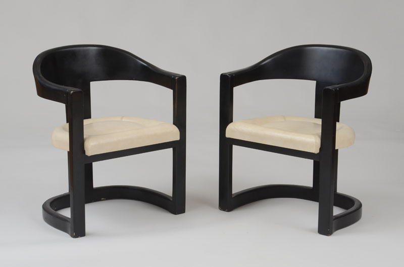 Appraisal: KARL SPRINGER PAIR OF ONASSIS CHAIRS Black lacquer leather upholstery