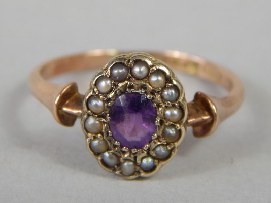 Appraisal: A ct gold dress ring set with amethyst and seed