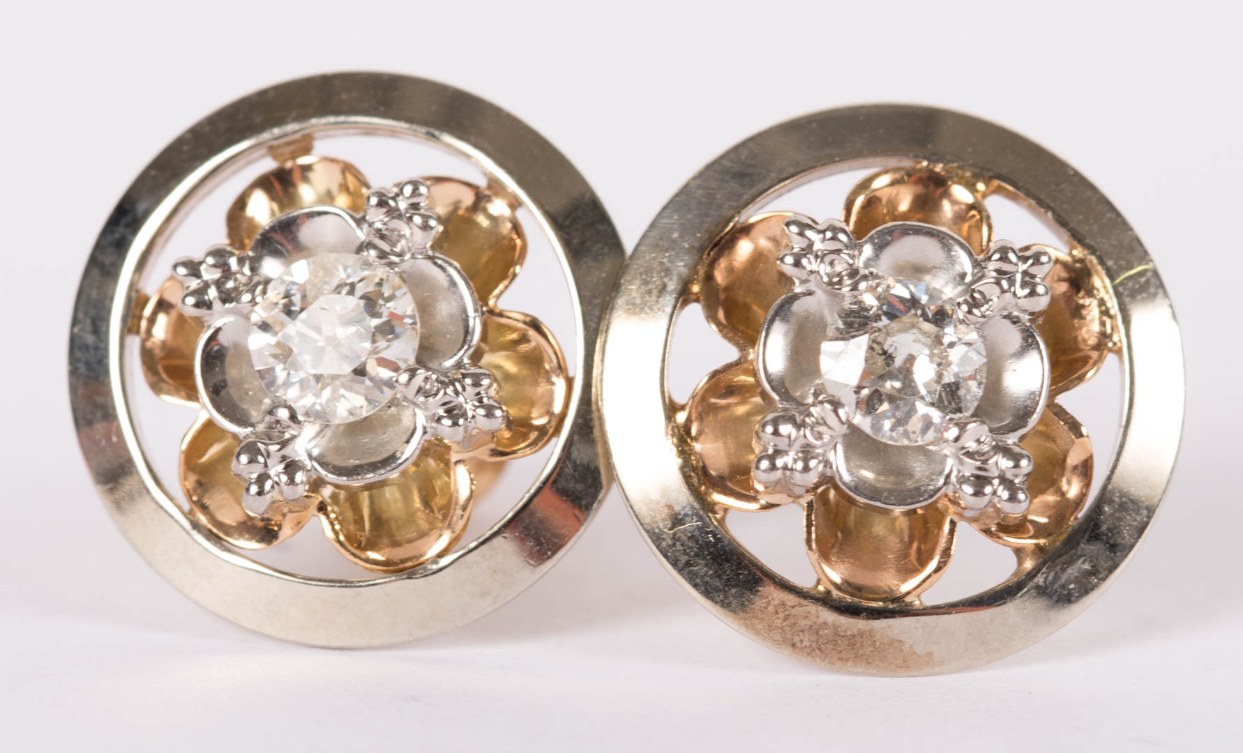 Appraisal: A Pair of Gold Diamond Floral Motif Earrings pair of