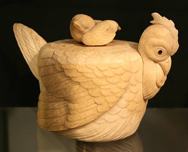 Appraisal: A Japanese pieced ivory hen shaped covered box The base