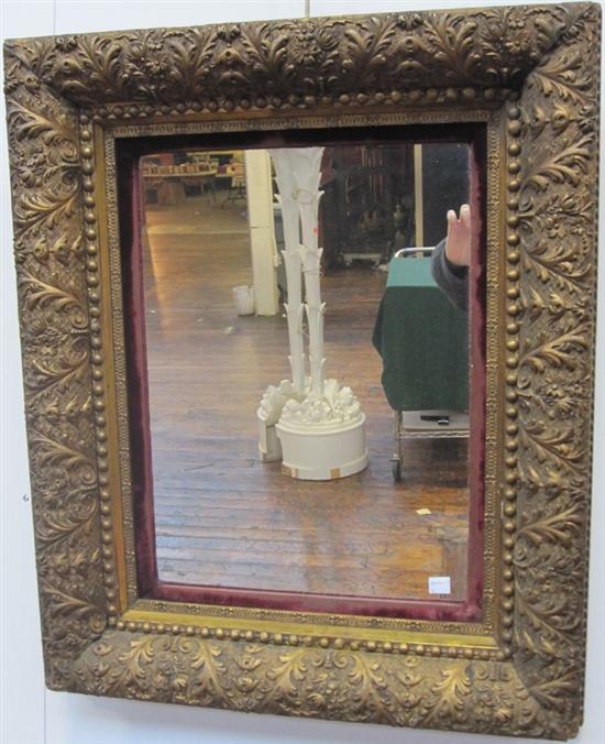 Appraisal: A TH C GILT GESSO MOLDED MIRROR A th C