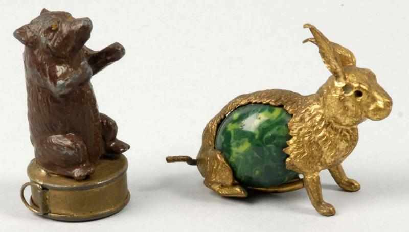 Appraisal: Lot of Sewing Tape Measures Description Includes a seated rabbit