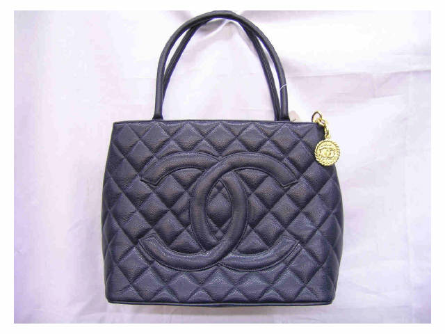 Appraisal: Chanel handbag navy blue quilted leather with leather handles tag