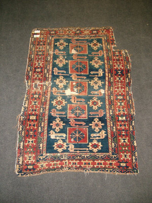 Appraisal: A Kuba rug with five brick red panels in a