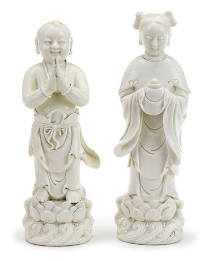 Appraisal: Pair of Chinese blanc de chine boy and girl figures