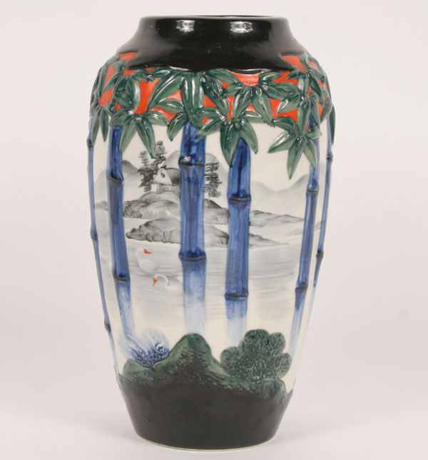 Appraisal: Japanese ceramic vase embossed bamboo trees framing seascape with swans