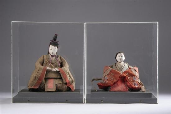 Appraisal: PAIR JAPANESE DOLLS AND STANDS - Dolls in high stands