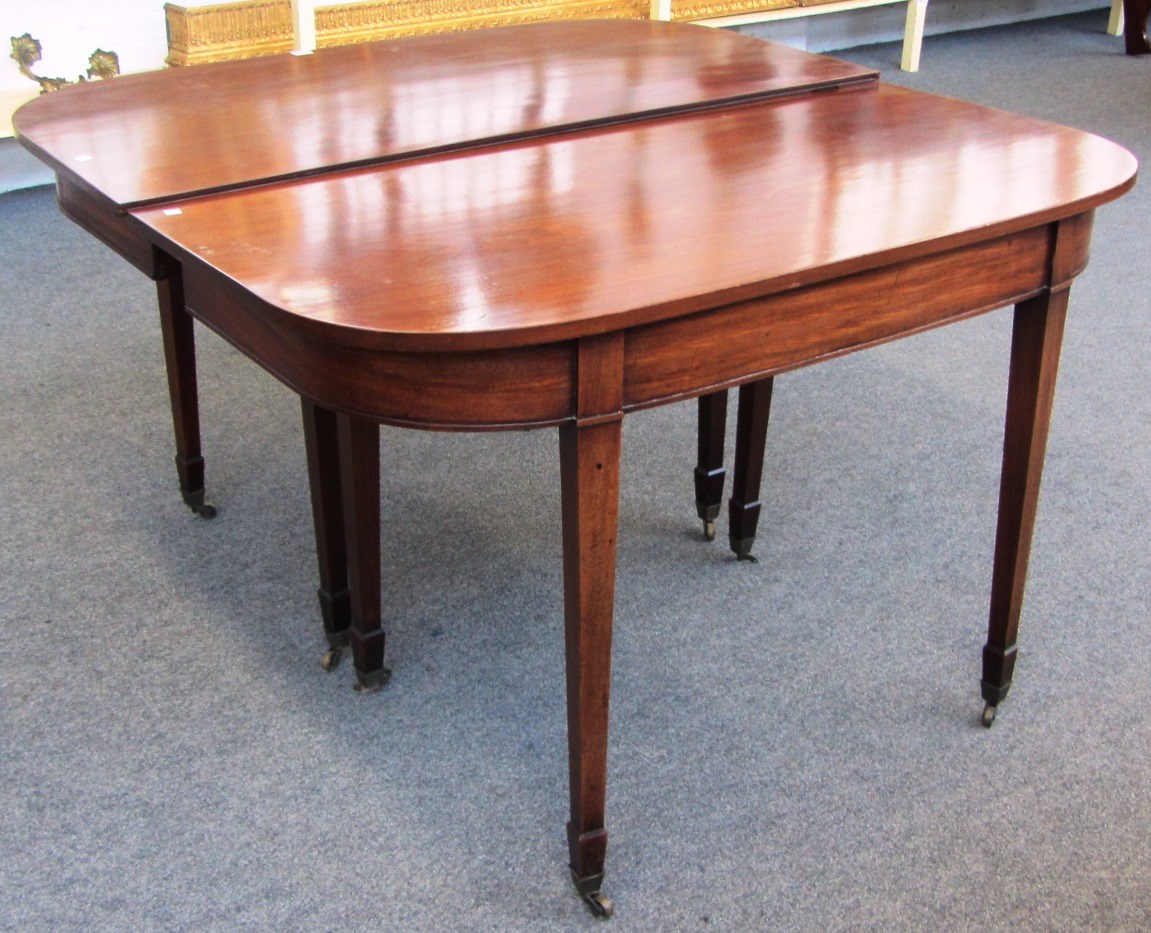 Appraisal: A pair of George III mahogany 'D' end tables on