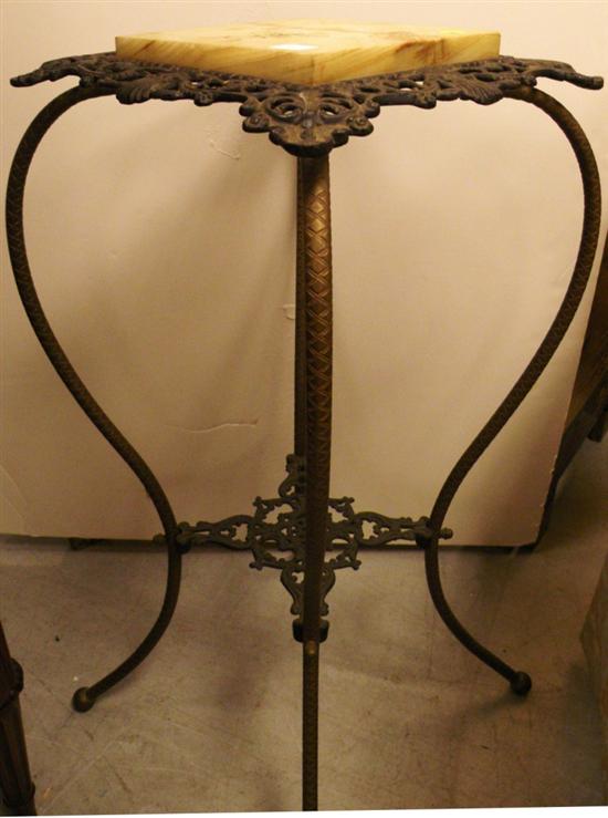 Appraisal: Marble top plant stand pierced brass and metal shaped base