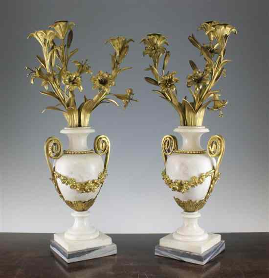 Appraisal: A pair of th century gilt bronze mounted white marble