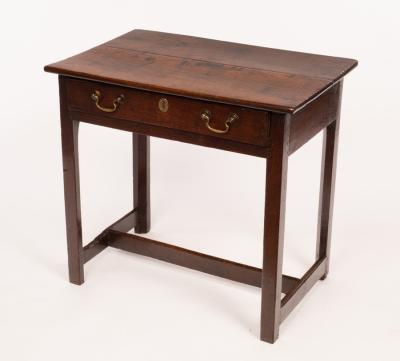 Appraisal: An th Century oak side table fitted a frieze drawer