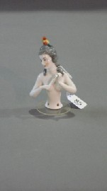 Appraisal: A German porcelain Art Deco half doll her head tilted