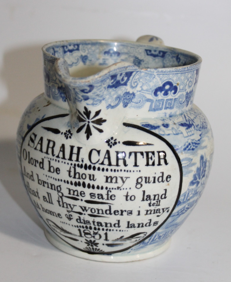 Appraisal: A thC pearlware blue and white sailor's motto jug the