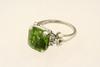 Appraisal: LADY'S RING - Platinum peridot and diamond ring set with