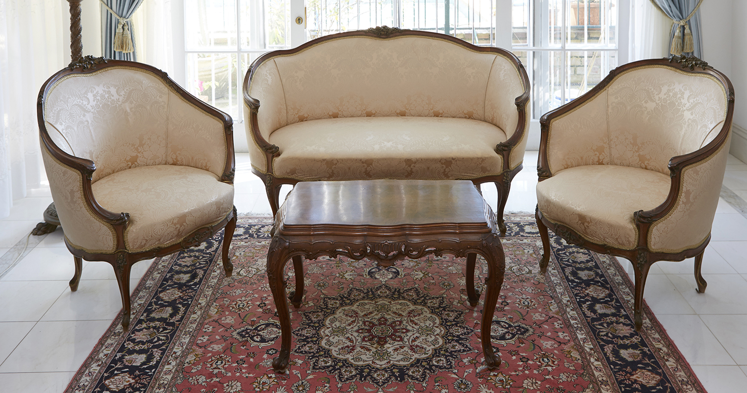 Appraisal: A ROCOCO REVIVAL WALNUT PARLOUR SUITE PROBABLY SPANISH Comprising two-seater