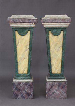 Appraisal: PAIR OF BAROQUE-STYLE MARBELIZED METAL PEDESTALS Each square molded top