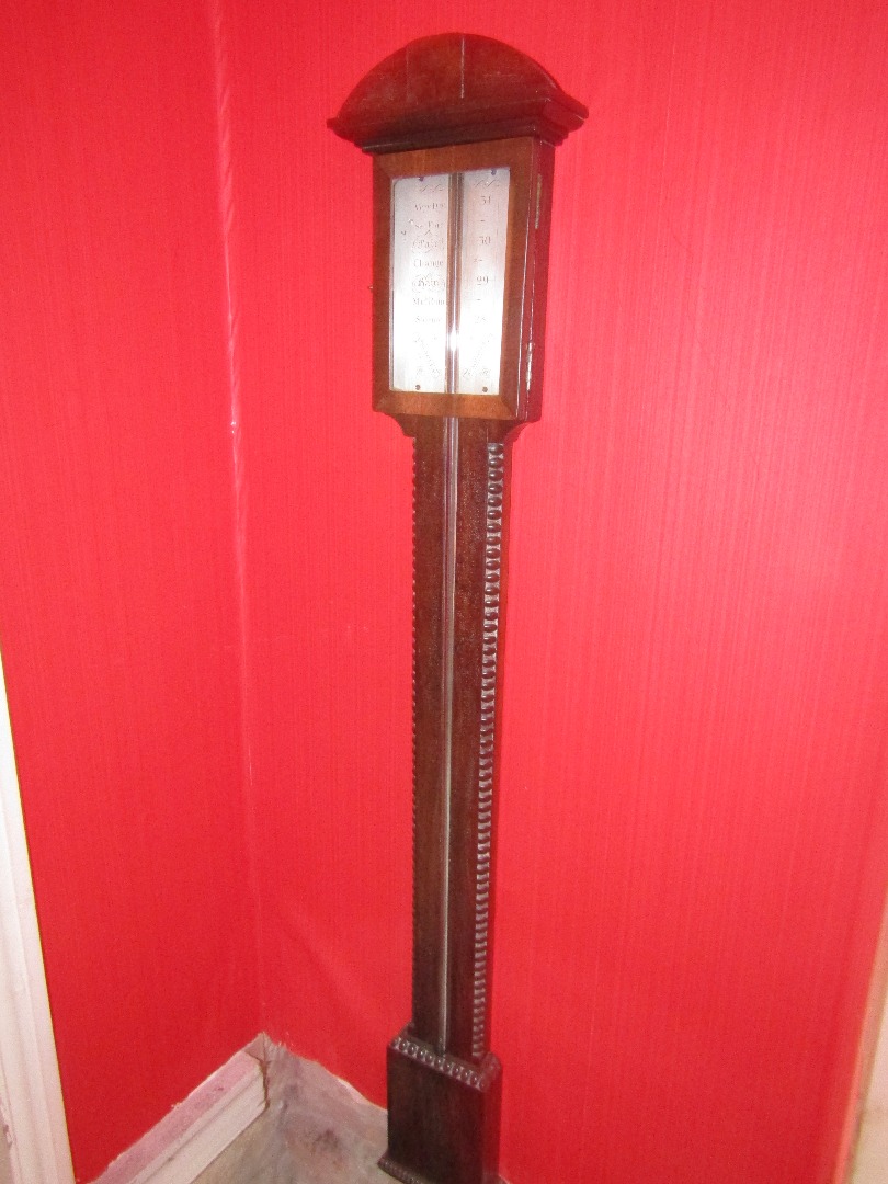 Appraisal: A thC rosewood stick barometer with later silvered register and