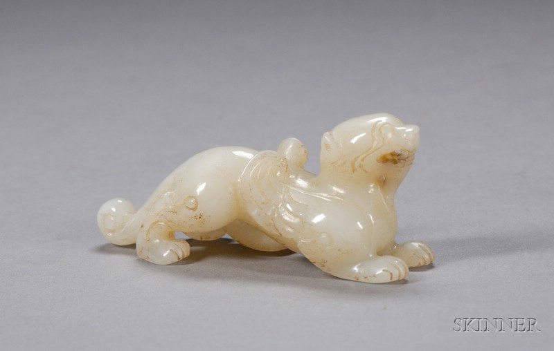 Appraisal: Jade Chimera China th century white stone lg in