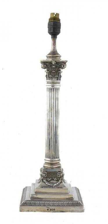 Appraisal: A VICTORIAN CORINTHIAN COLUMN LAMP the stepped square base embossed