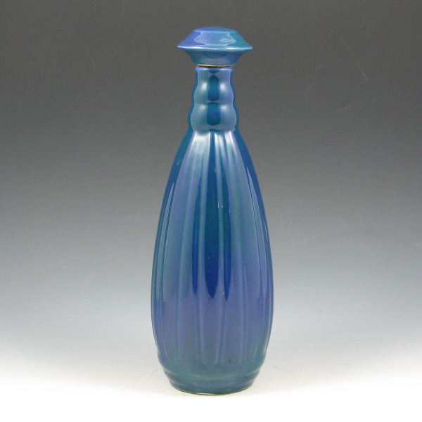 Appraisal: Cowan stoppered decanter in gorgeous Arabian Night glaze Marked COWAN