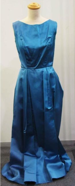 Appraisal: Evening dress in blue satin with pleated skirt circa Provenance